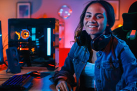 Picture of happy female pc gamer after her computer was upgraded