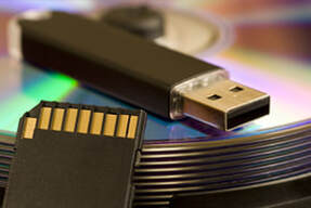 Picture of thumb drive and memory cards that need data recovery